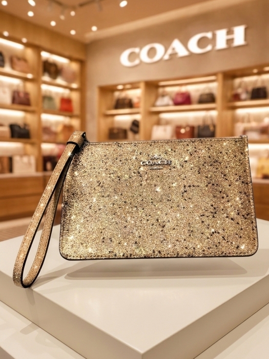 Coach Handbags - Coach Glitter Star Wristlet